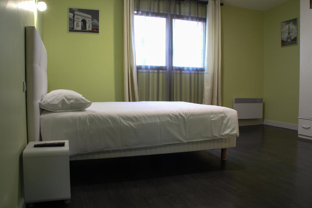 Hotel De France Boulogne-Billancourt Habitación foto